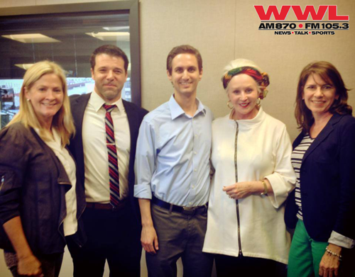 HEROfarm's Reid Stone and Shaun Walker join host Angela Hill and two other guests for a picture, standing together in the WWL AM-FM radio studio prior to their interview.